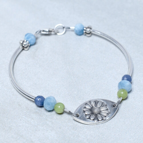 aquamarine sterling silver daisy compassion bracelet