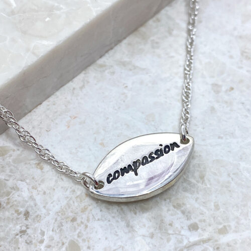 Daisy Mae Silver Compassion Necklace